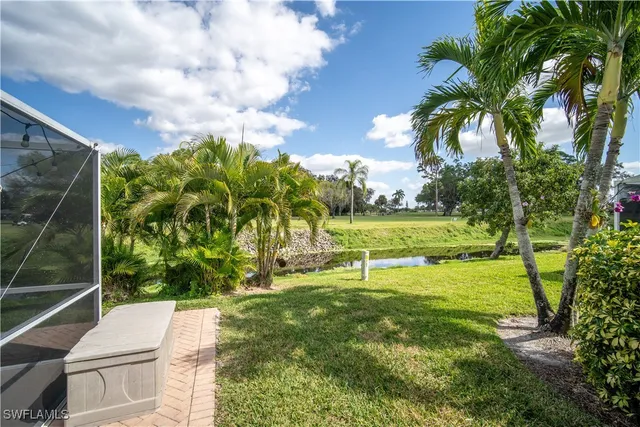 a view of yard with swimming pool