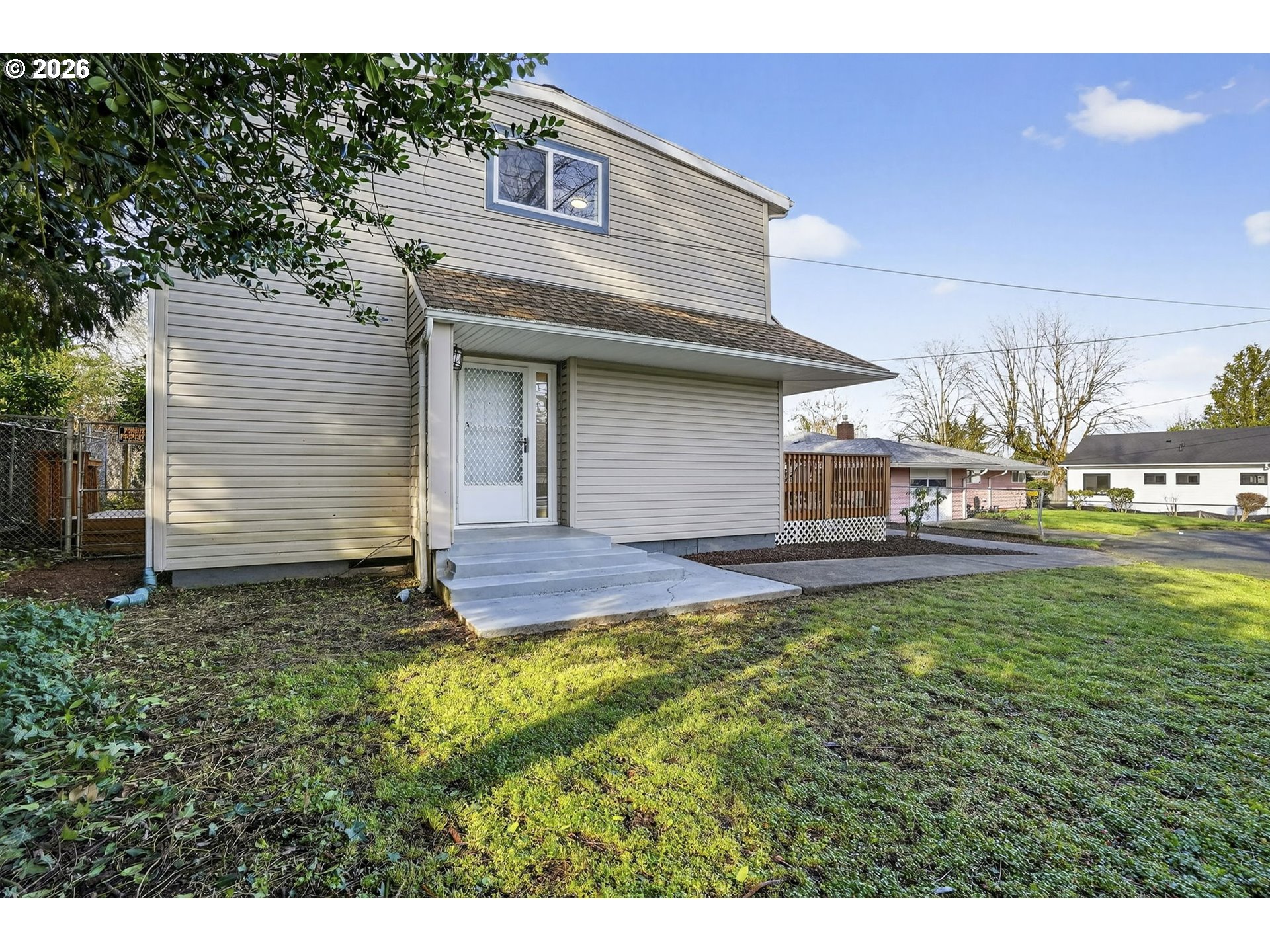 5249 Northeast 45th Place Portland, OR 97218 - Photo 2 of 48 a view of a house with a yard