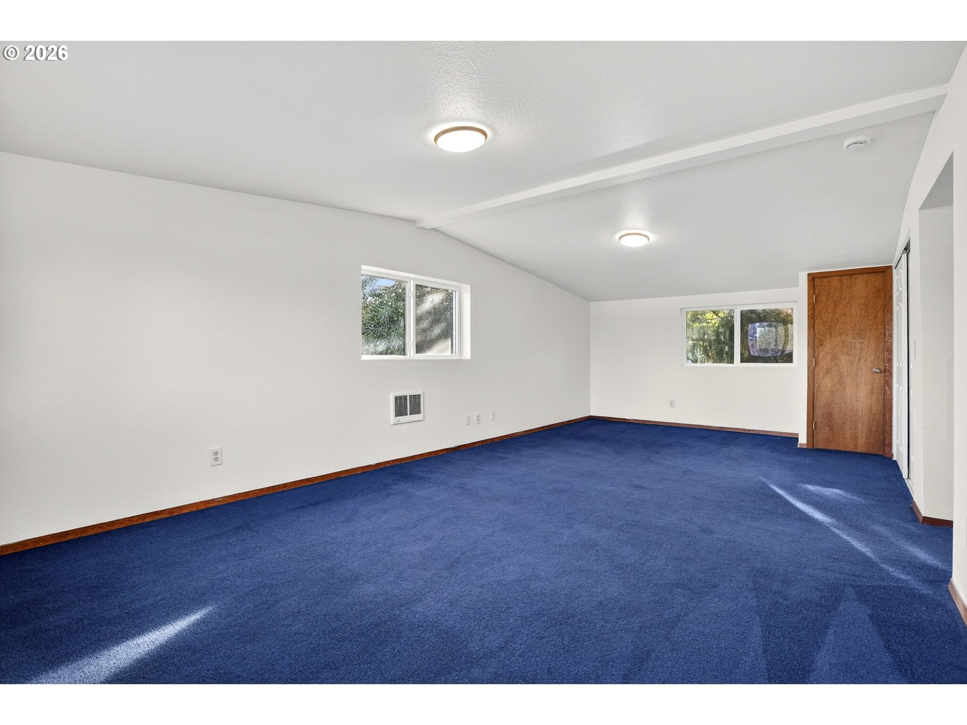 5249 Northeast 45th Place Portland, OR 97218 - Photo 25 of 48 a view of an empty room with a window