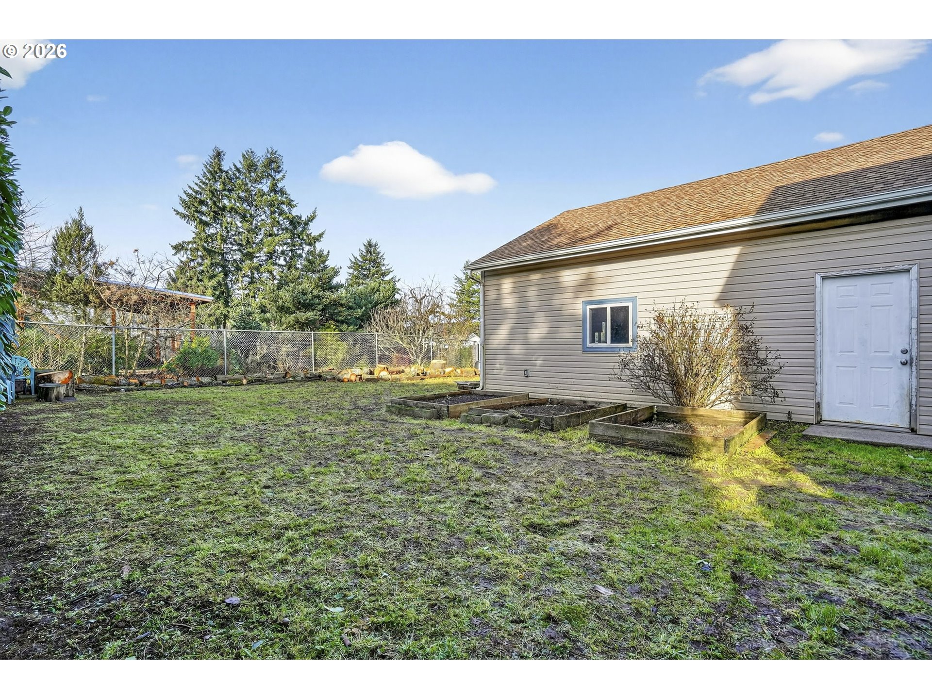 5249 Northeast 45th Place Portland, OR 97218 - Photo 43 of 48 a view of a house with a yard