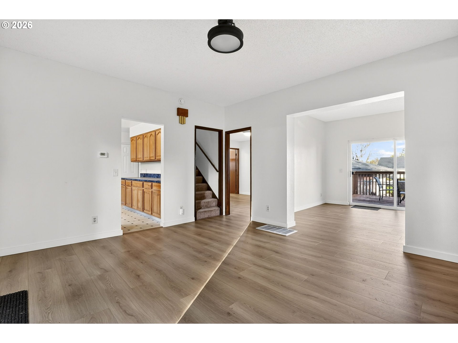 5249 Northeast 45th Place Portland, OR 97218 - Photo 8 of 48 a view interior of a house and wooden floor