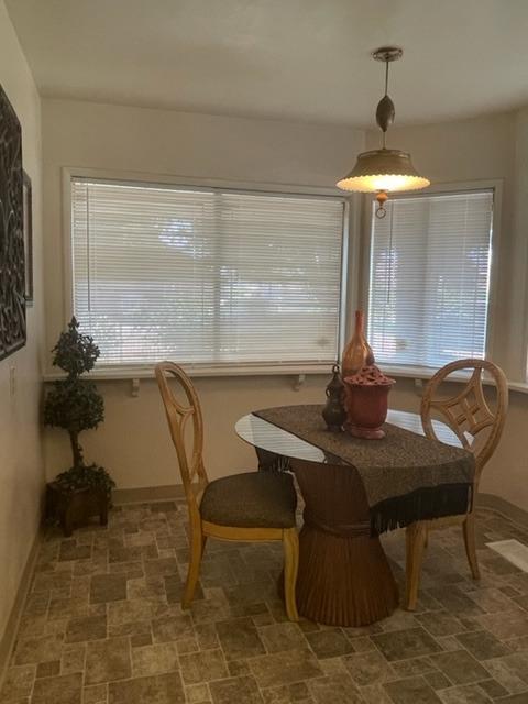42943 Road 114 Dinuba, CA 93618 - Photo 27 of 40 a view of a dining room with furniture and window