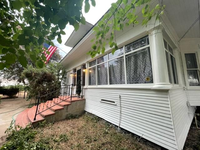 42943 Road 114 Dinuba, CA 93618 - Photo 9 of 40 a view of a house with backyard and sitting area