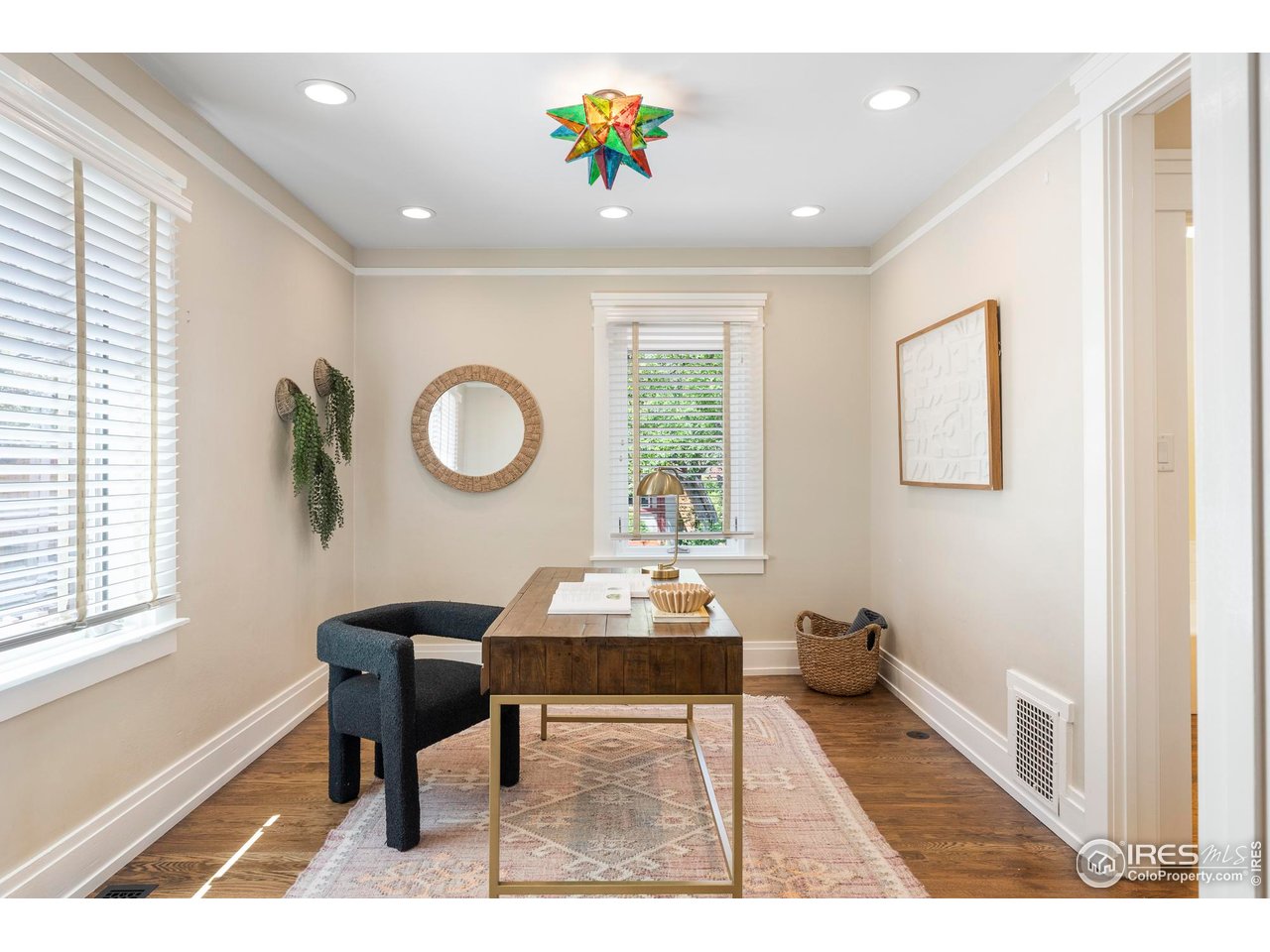 721 9th Street Boulder, CO 80302 - Photo 14 of 40 a living room with furniture and a window