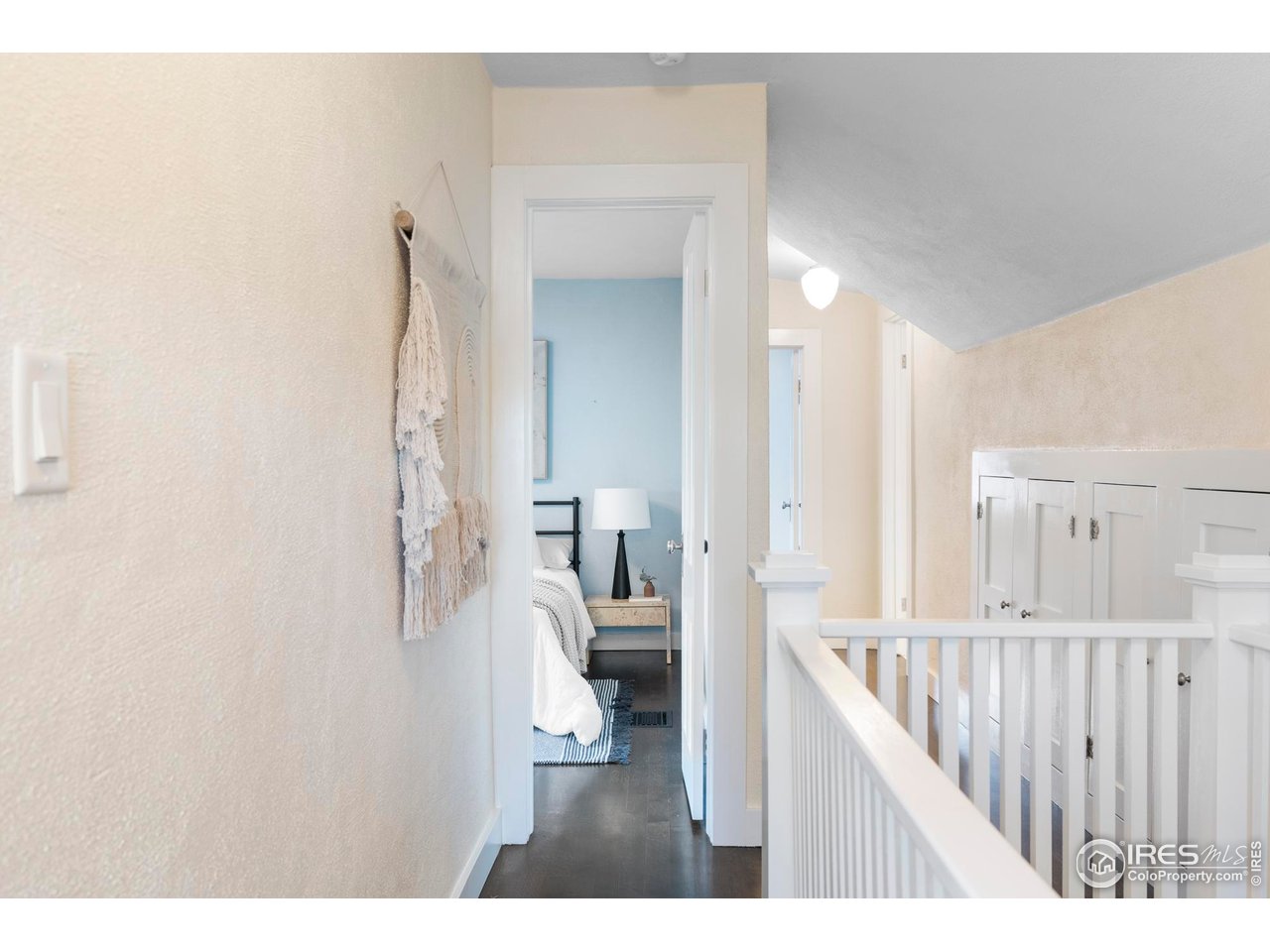 721 9th Street Boulder, CO 80302 - Photo 17 of 40 a living room with furniture and a wooden floor