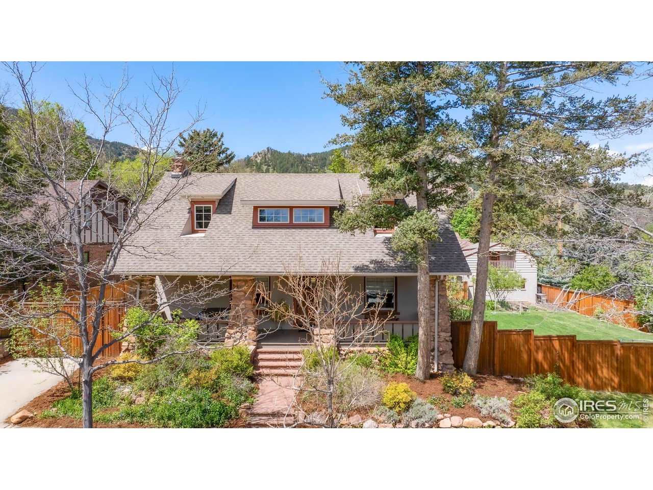 721 9th Street Boulder, CO 80302 - Photo 2 of 40 a picture of a house with a yard