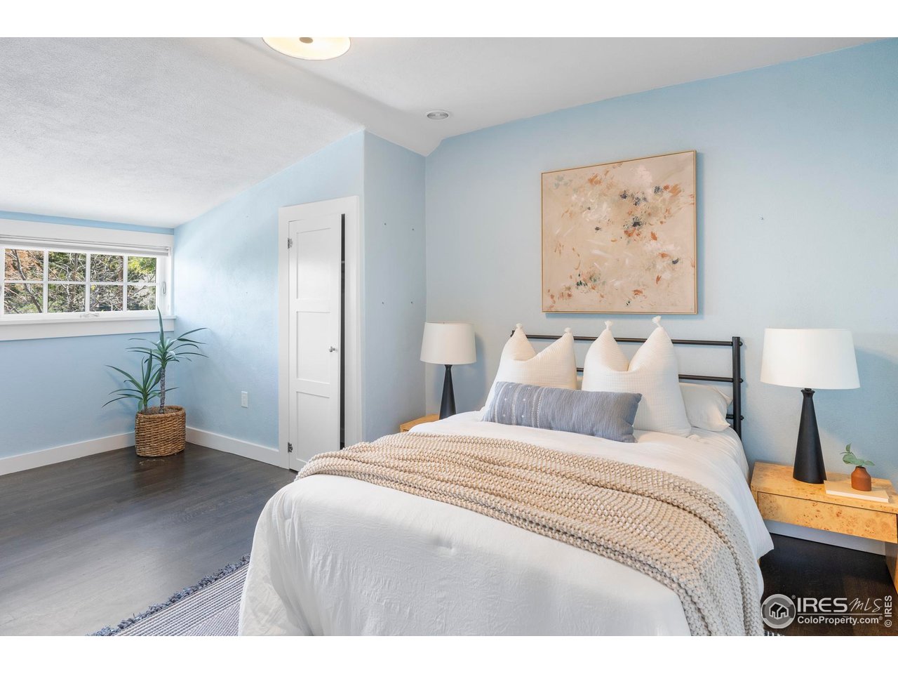 721 9th Street Boulder, CO 80302 - Photo 22 of 40 a bedroom with bed and window