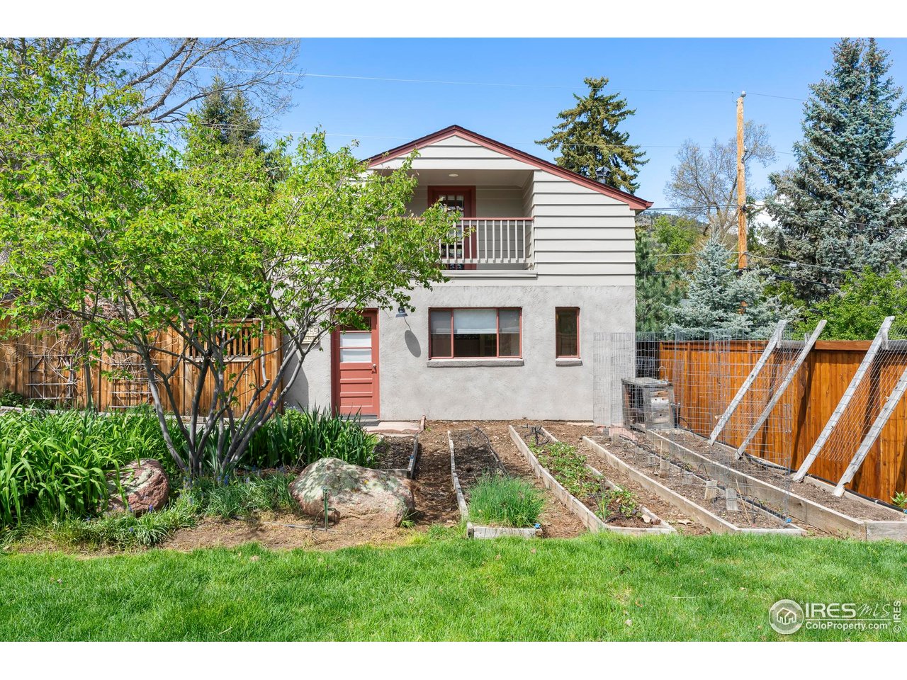 721 9th Street Boulder, CO 80302 - Photo 25 of 40 a view of a house with backyard