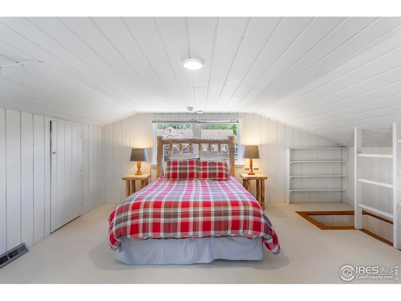 721 9th Street Boulder, CO 80302 - Photo 28 of 40 a bedroom with a bed and a view of closet