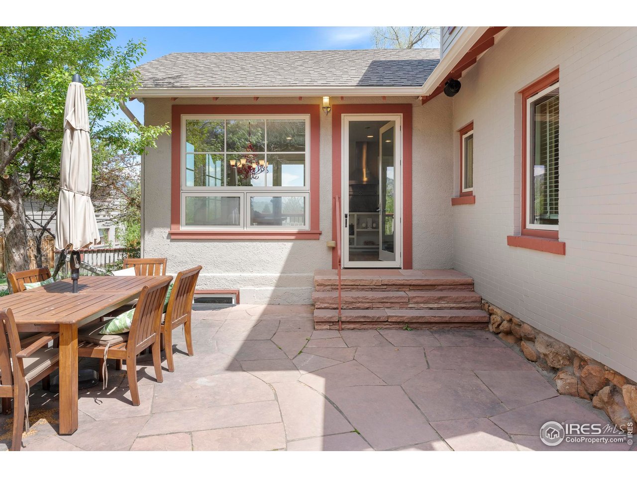 721 9th Street Boulder, CO 80302 - Photo 34 of 40 a view of a dining room with furniture window and outside view