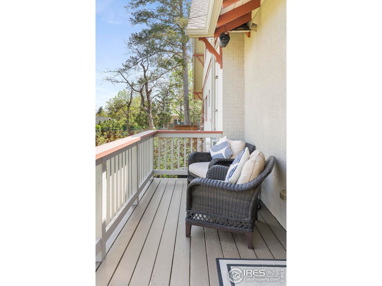 721 9th Street Boulder, CO 80302 - Photo 36 of 40 a balcony with table and chairs