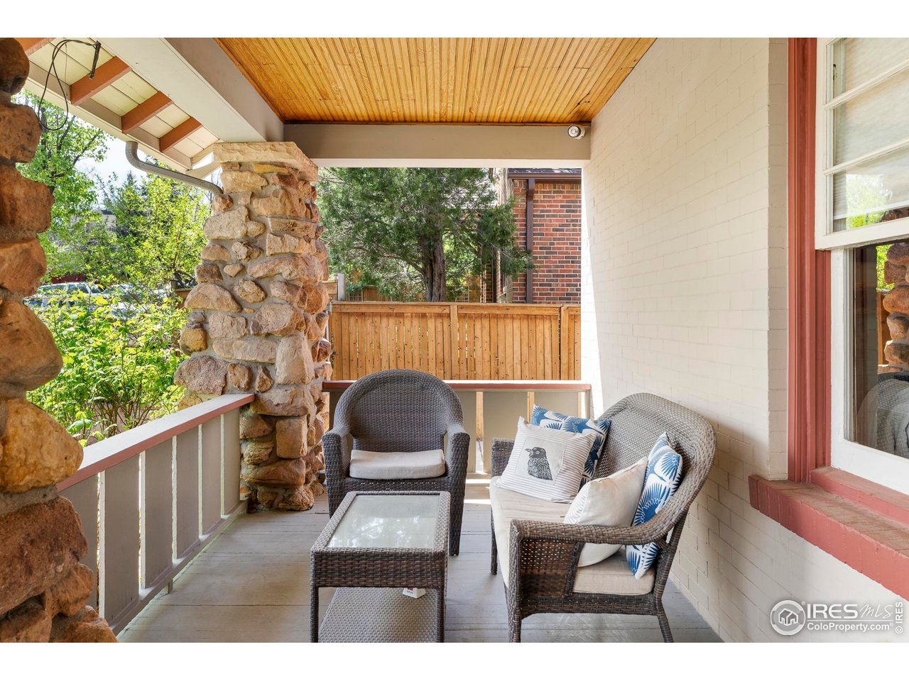 721 9th Street Boulder, CO 80302 - Photo 4 of 40 a outdoor living space with furniture and garden view