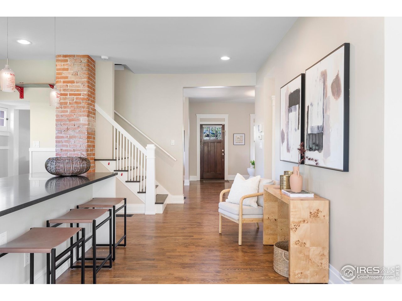 721 9th Street Boulder, CO 80302 - Photo 8 of 40 a living room with furniture and wooden floor