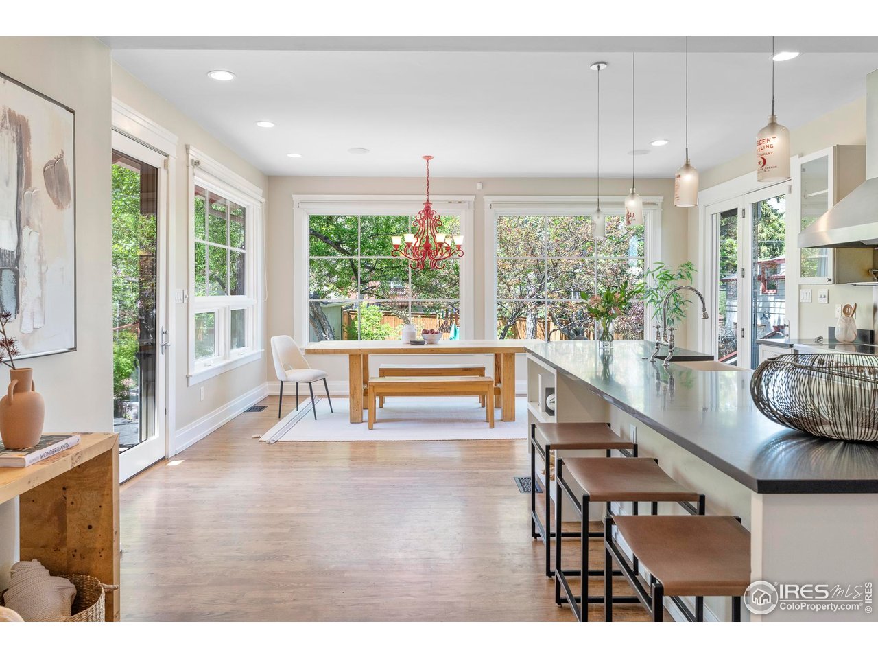 721 9th Street Boulder, CO 80302 - Photo 9 of 40 a dining room with furniture and a large window