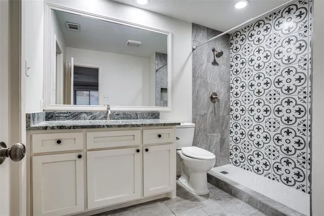 a bathroom with a sink and a toilet