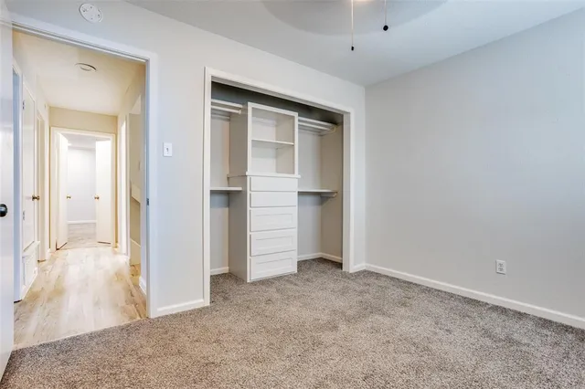wooden floor and closet in a room