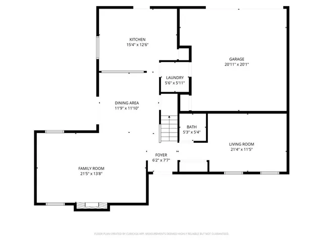 a picture of a bench in front of gate