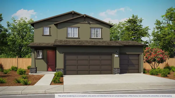a front view of a house with garage