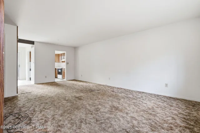 an empty room with a natural light