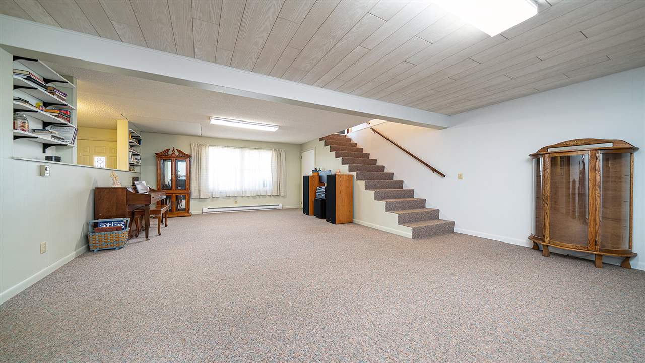 1989 Grand Detour Road Dixon, IL 61021 - Photo 17 of 39 a view of a livingroom with furniture and staircase