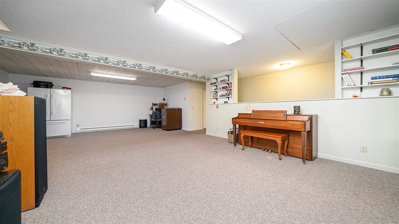 1989 Grand Detour Road Dixon, IL 61021 - Photo 18 of 39 a room with furniture and a projector