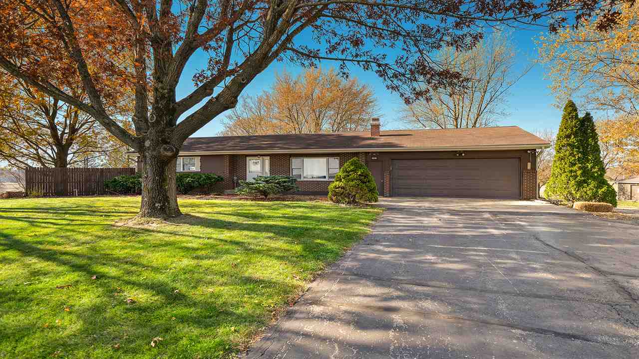 1989 Grand Detour Road Dixon, IL 61021 - Photo 2 of 39 a front view of a house with a yard