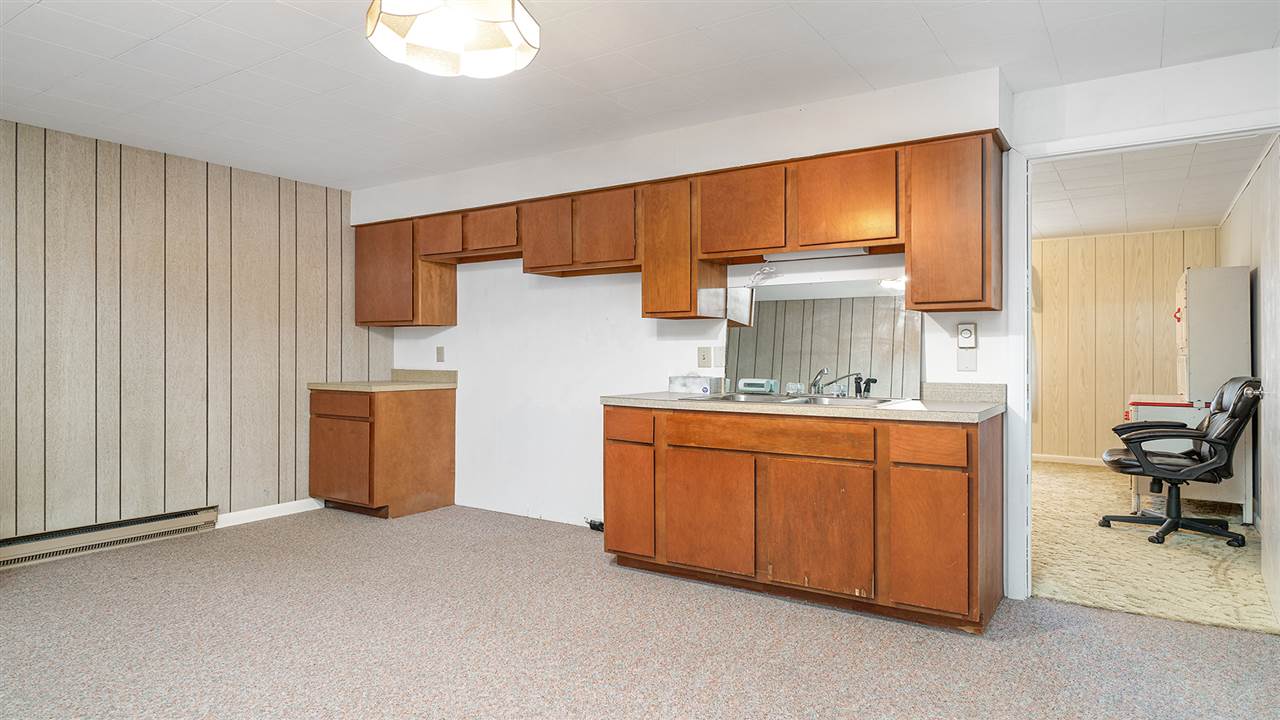 1989 Grand Detour Road Dixon, IL 61021 - Photo 21 of 39 a kitchen with stainless steel appliances a refrigerator and cabinets