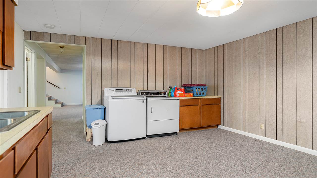 1989 Grand Detour Road Dixon, IL 61021 - Photo 22 of 39 a utility room with cabinets washer and dryer