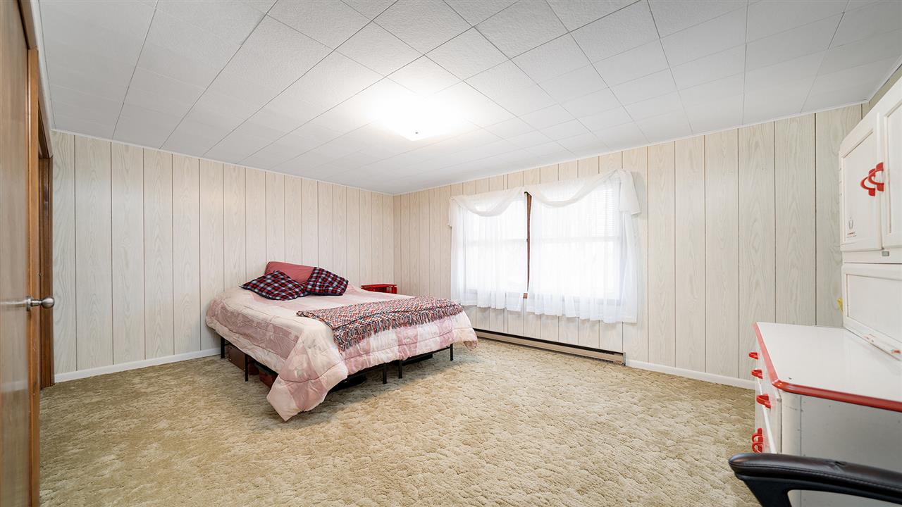 1989 Grand Detour Road Dixon, IL 61021 - Photo 23 of 39 a spacious bedroom with a bed and a window