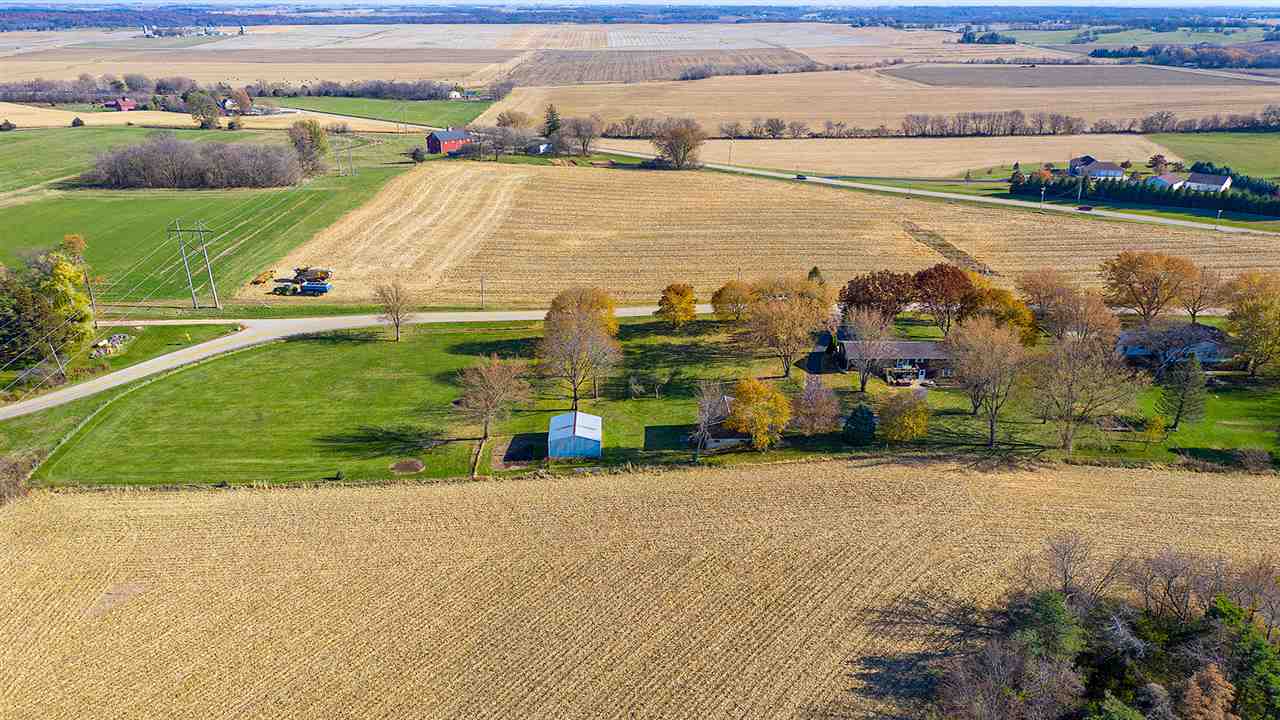 1989 Grand Detour Road Dixon, IL 61021 - Photo 30 of 39 an aerial view of a house with a yard and lake view