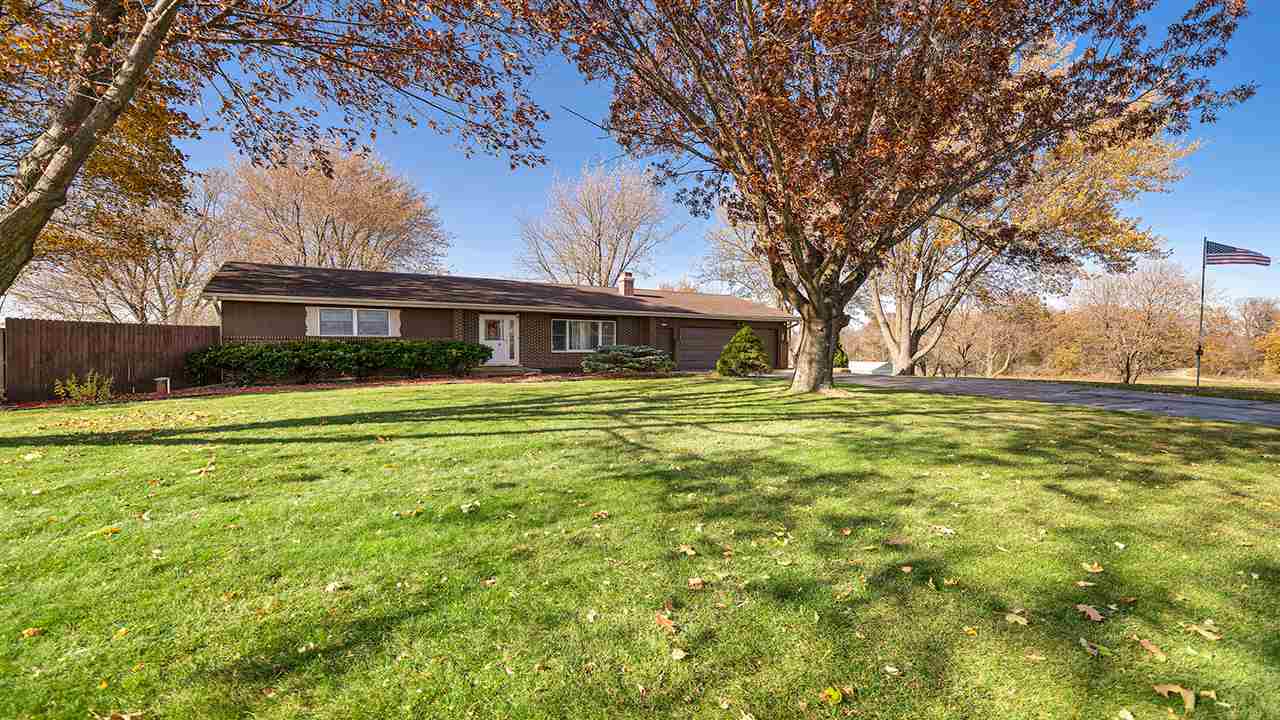 1989 Grand Detour Road Dixon, IL 61021 - Photo 33 of 39 a front view of a house with a yard