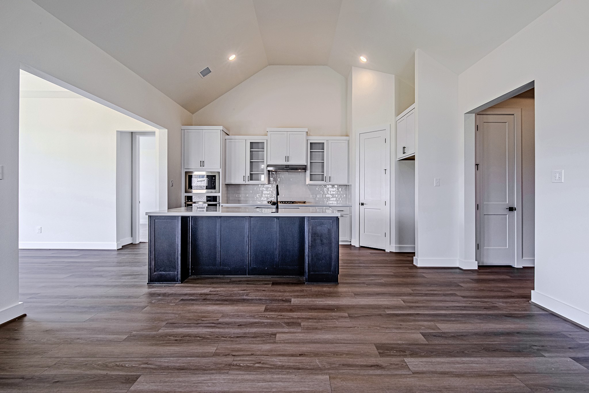 157 Peninsula Point Drive Montgomery, TX 77356 - Photo 7 of 33 a view of kitchen and wooden floor