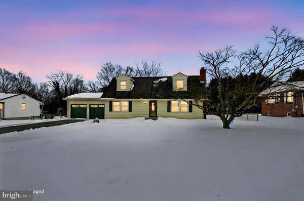 a view of a house with a street