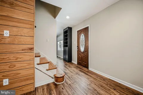 a view of entryway with wooden floor
