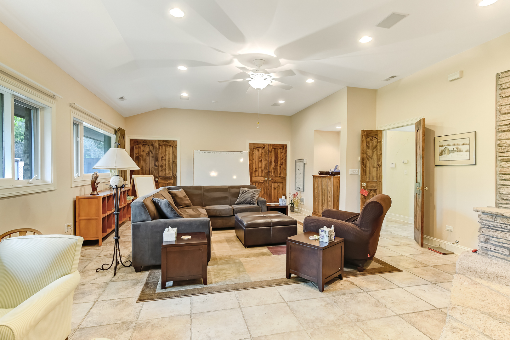 3500 Spring Road Oak Brook, IL 60523 - Photo 19 of 44 a living room with furniture and a flat screen tv
