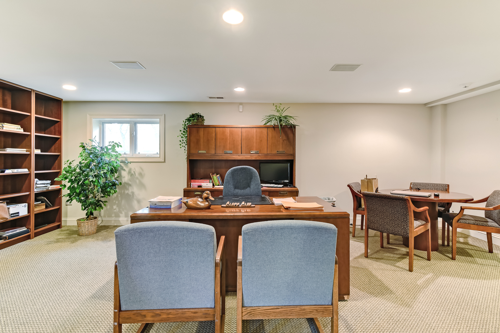 3500 Spring Road Oak Brook, IL 60523 - Photo 25 of 44 a dinning room with furniture a window and a fireplace
