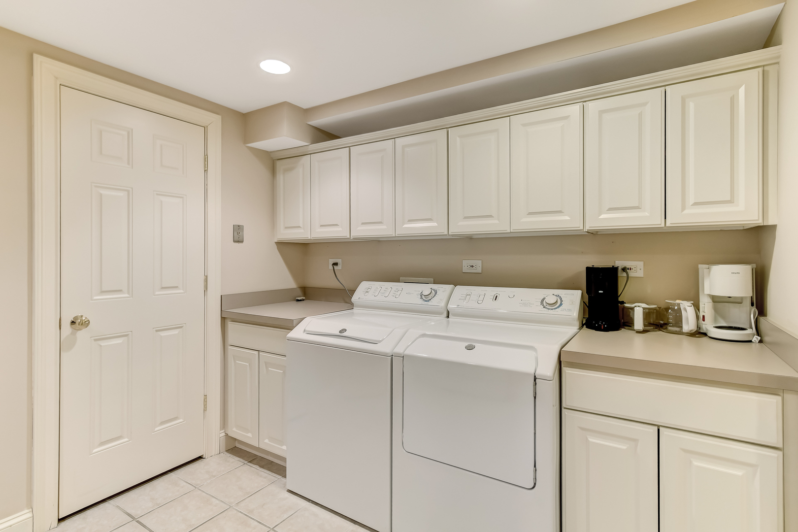 3500 Spring Road Oak Brook, IL 60523 - Photo 27 of 44 a utility room with dryer and washer