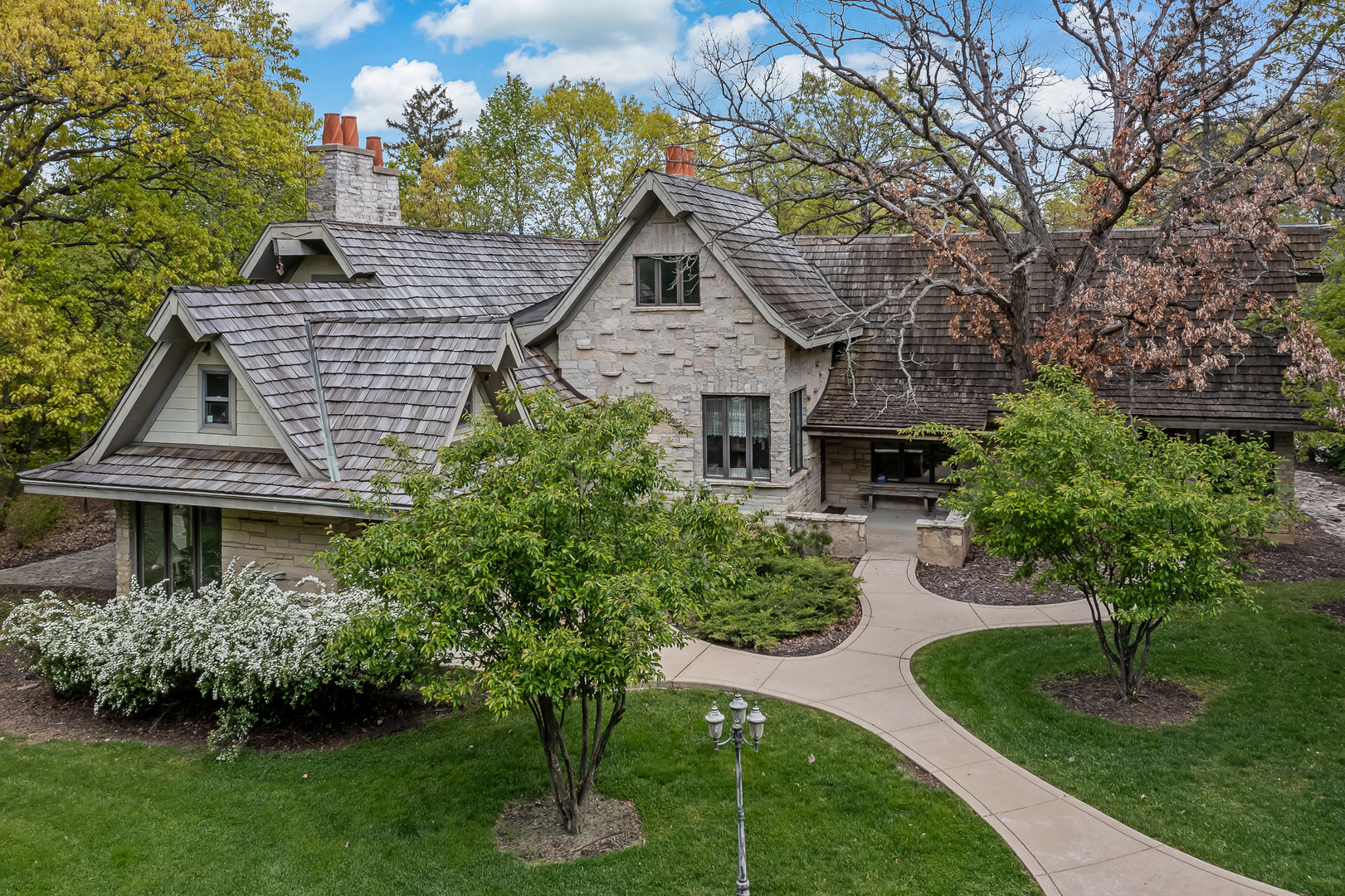 3500 Spring Road Oak Brook, IL 60523 - Photo 39 of 44 a front view of a house with a yard