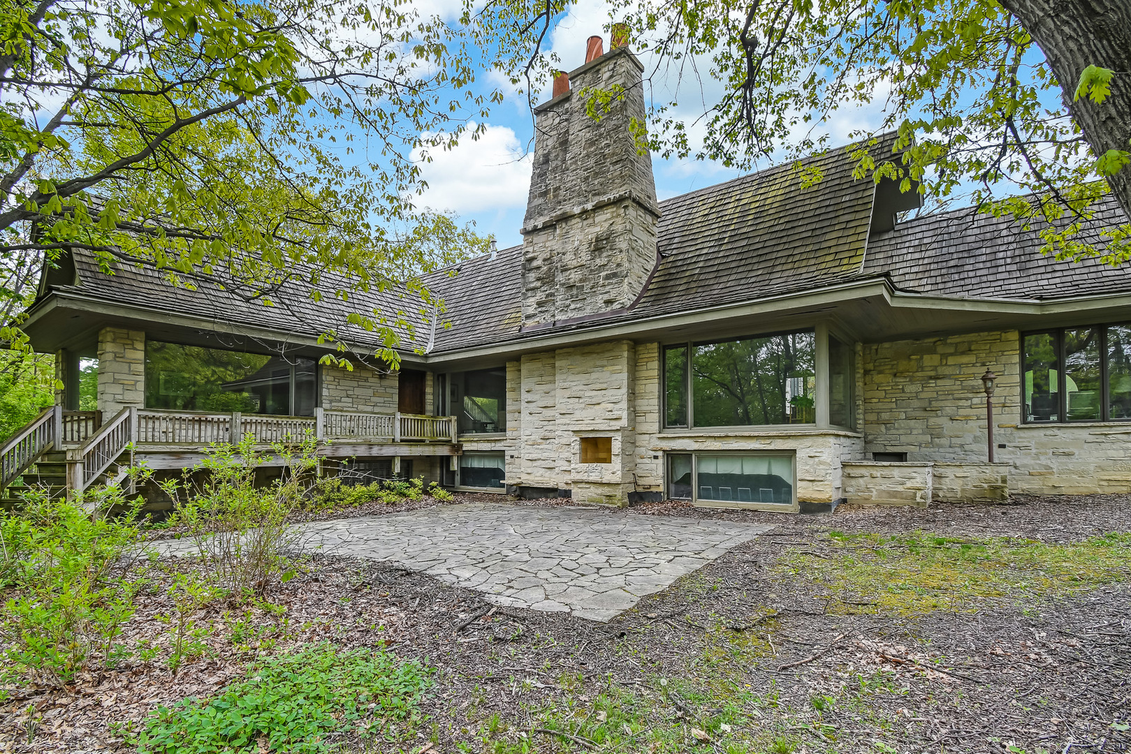 3500 Spring Road Oak Brook, IL 60523 - Photo 10 of 44 a view of a house with a yard and sitting area