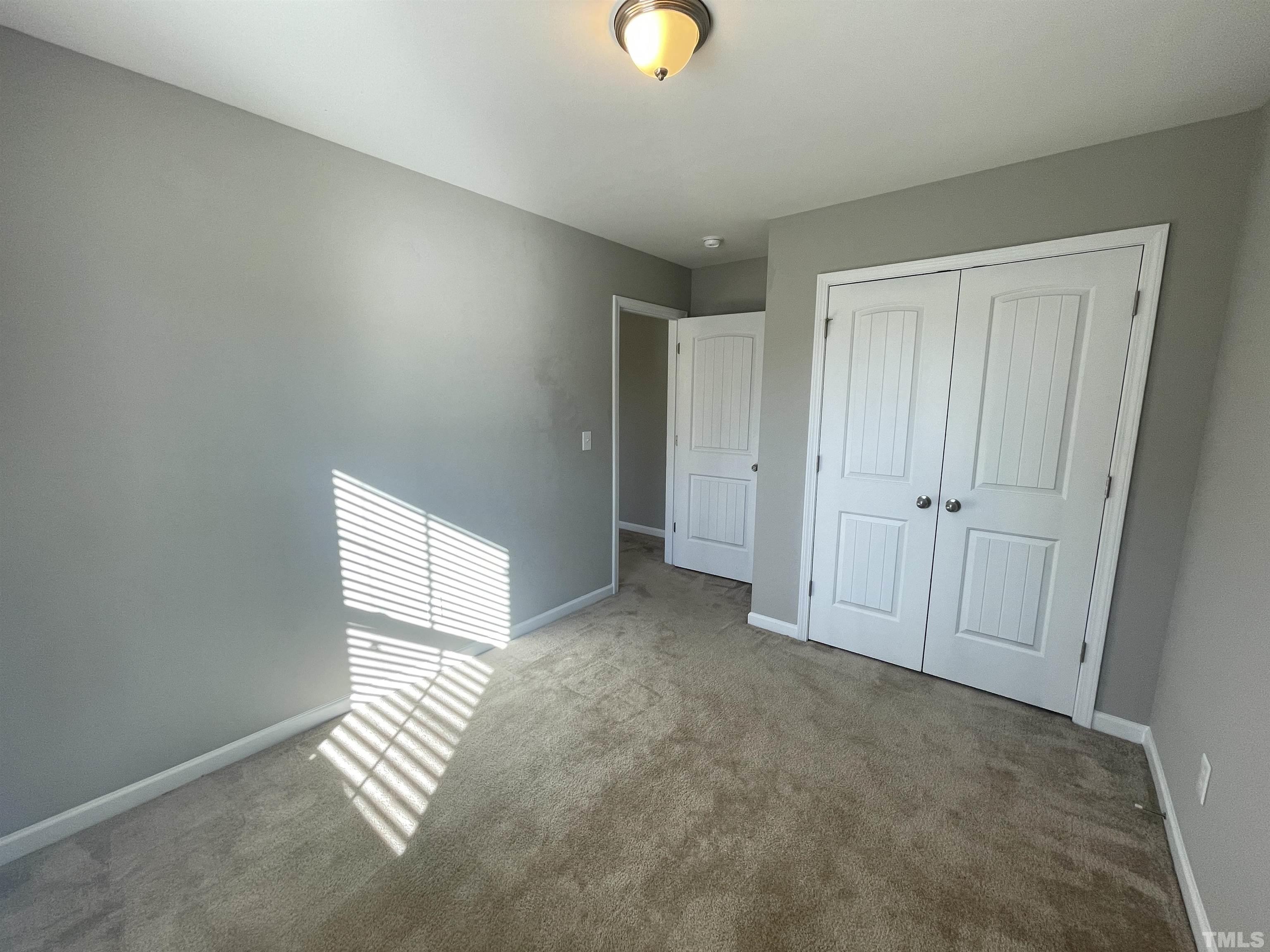 3928 Valley Side Court Cary, NC 27519 - Photo 16 of 26 an empty room with windows