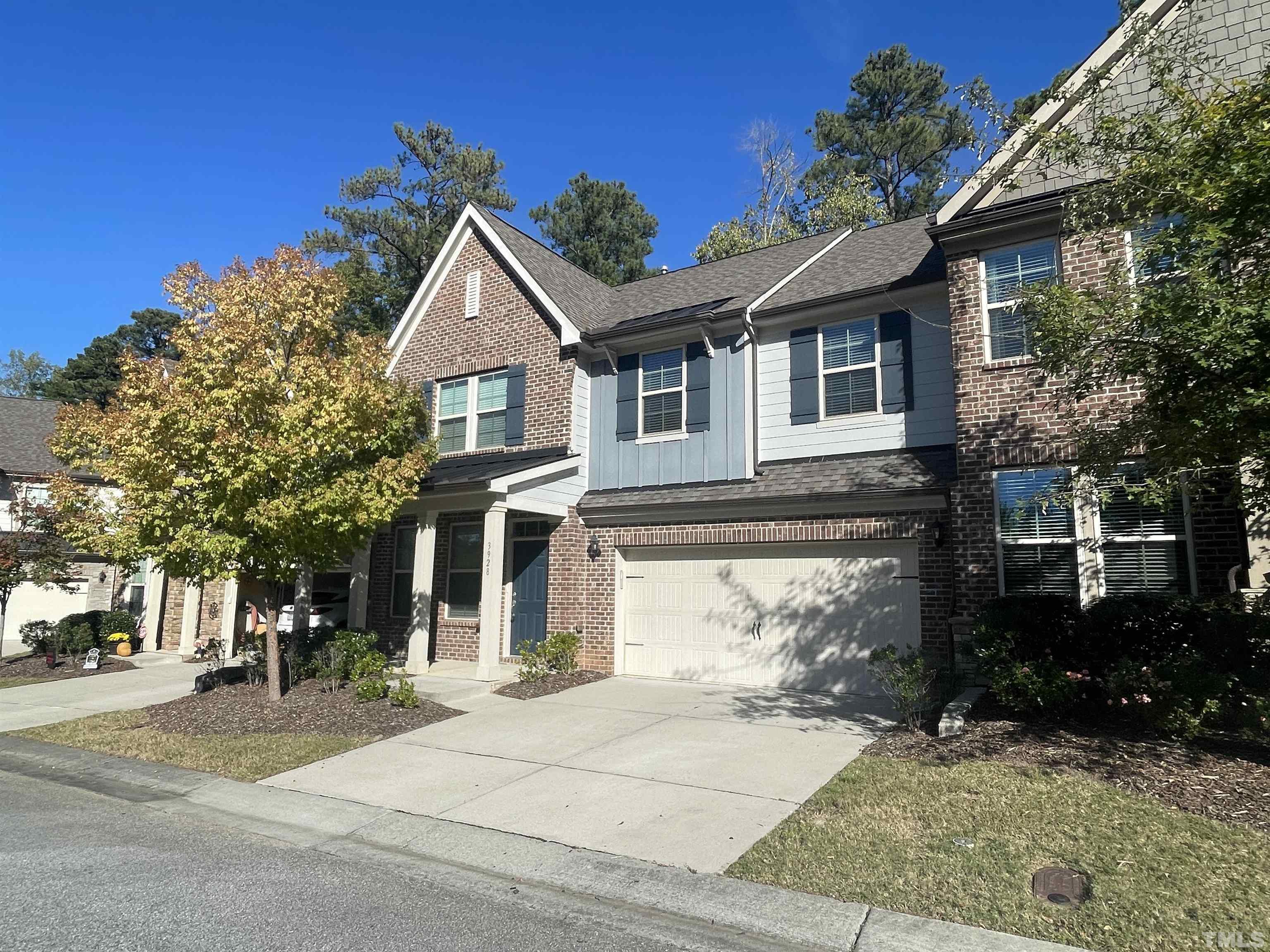 3928 Valley Side Court Cary, NC 27519 - Photo 2 of 26 front view of house with a yard