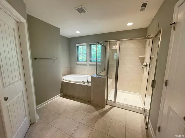 a bathroom with a sink vanity and a mirror