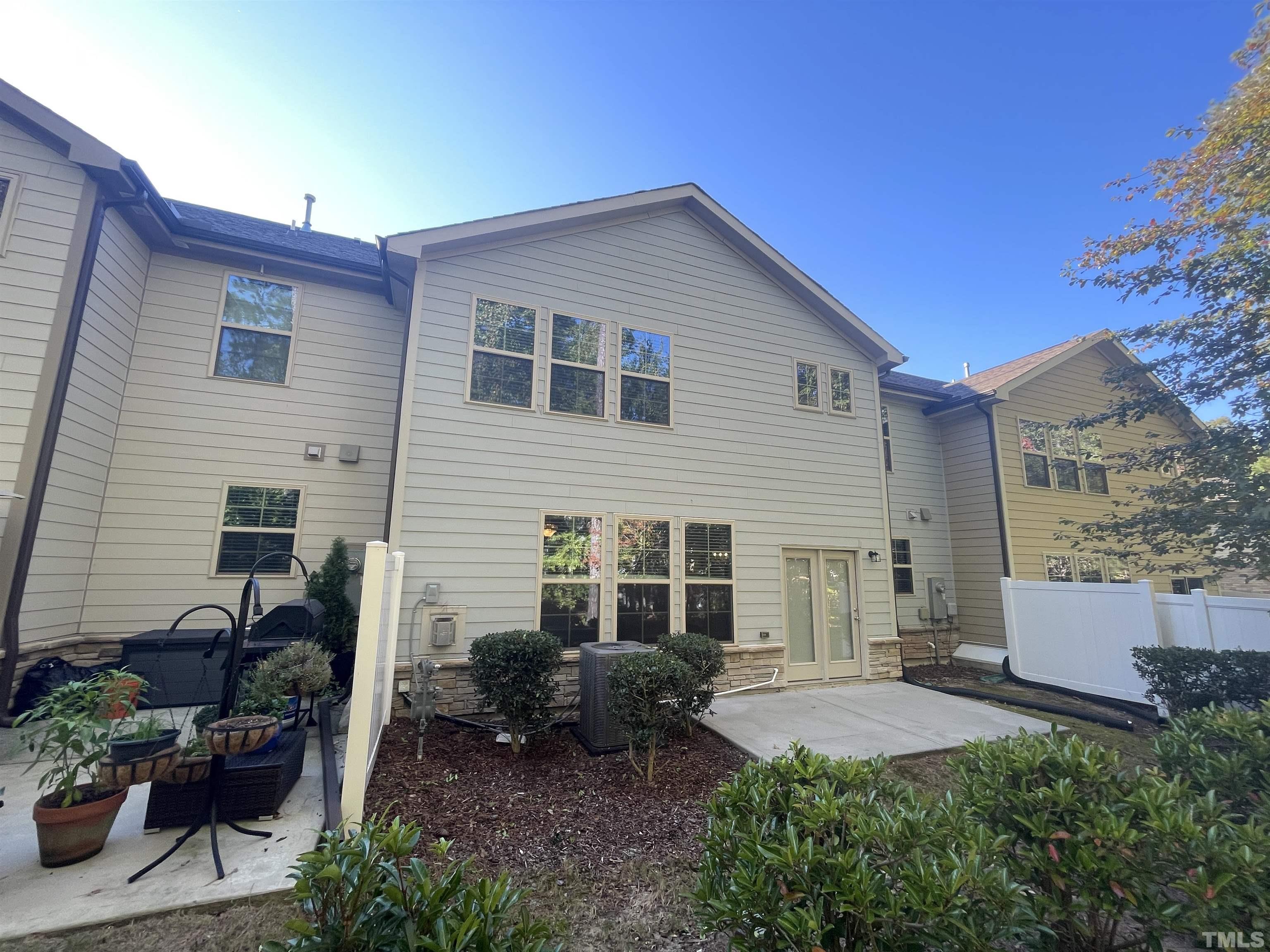 3928 Valley Side Court Cary, NC 27519 - Photo 25 of 26 a view of a house with backyard and sitting area