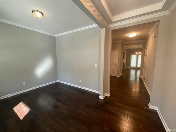 wooden floor in a hall with an entryway