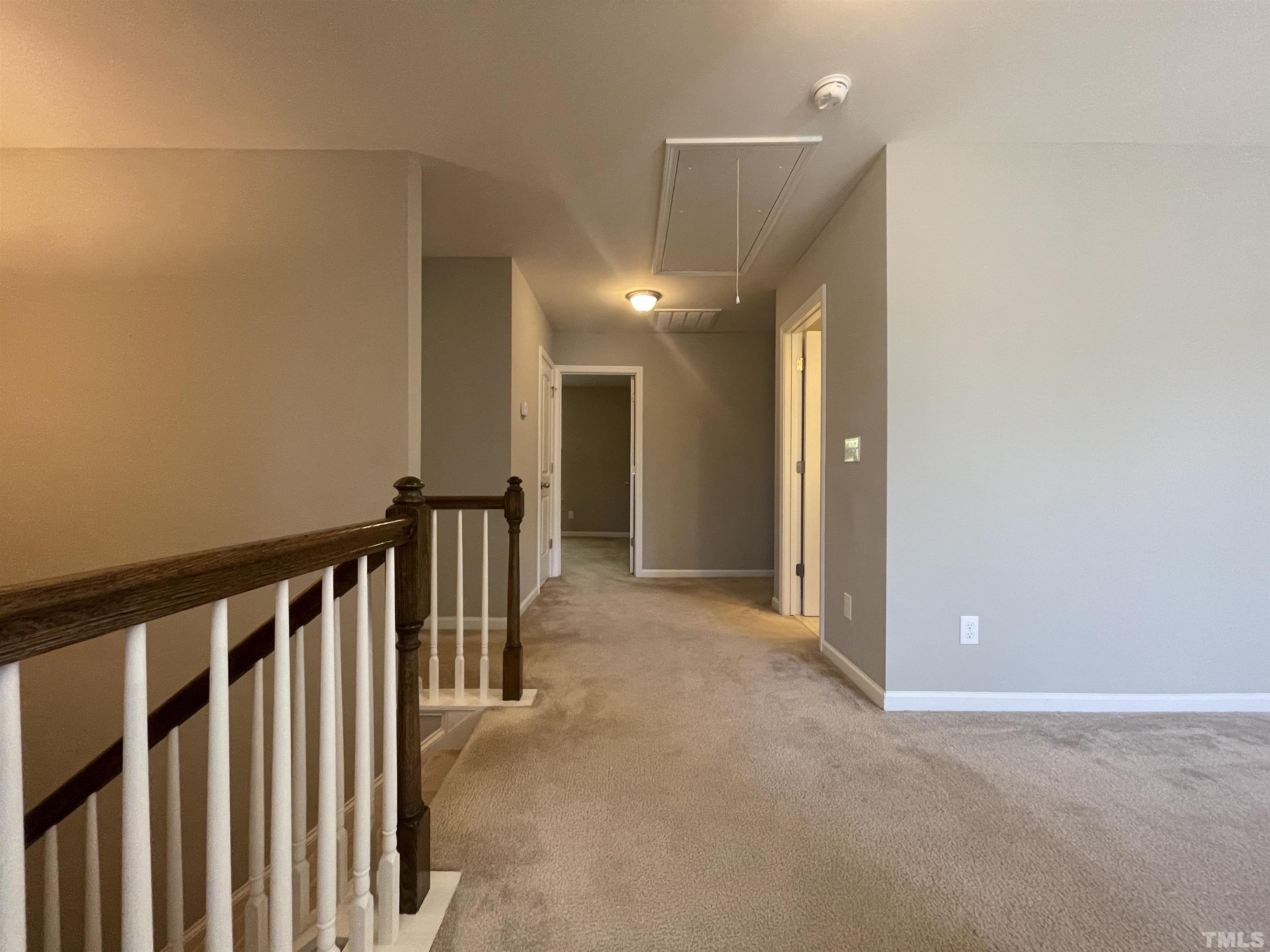 3928 Valley Side Court Cary, NC 27519 - Photo 10 of 26 a view of hallway with stairs