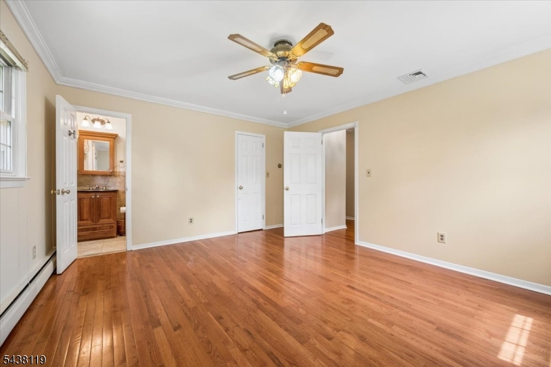 335 Drakestown Road Long Valley, NJ 07853 - Photo 18 of 34 wooden floor in an empty room with a window