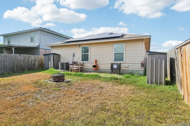 a view of backyard of house