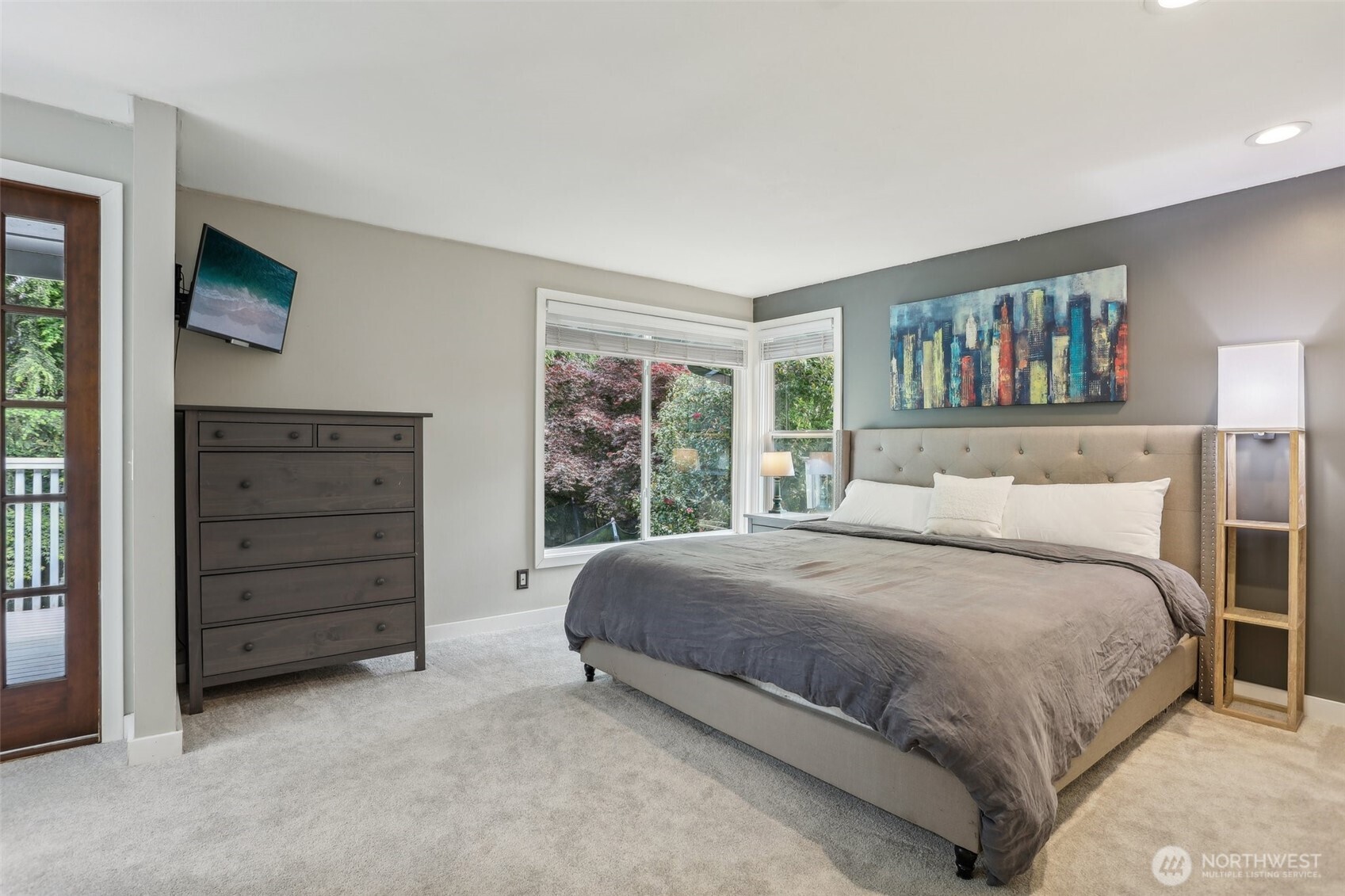 2711 164th Place Southeast Bothell, WA 98012 - Photo 11 of 26 a bedroom with a bed and a television