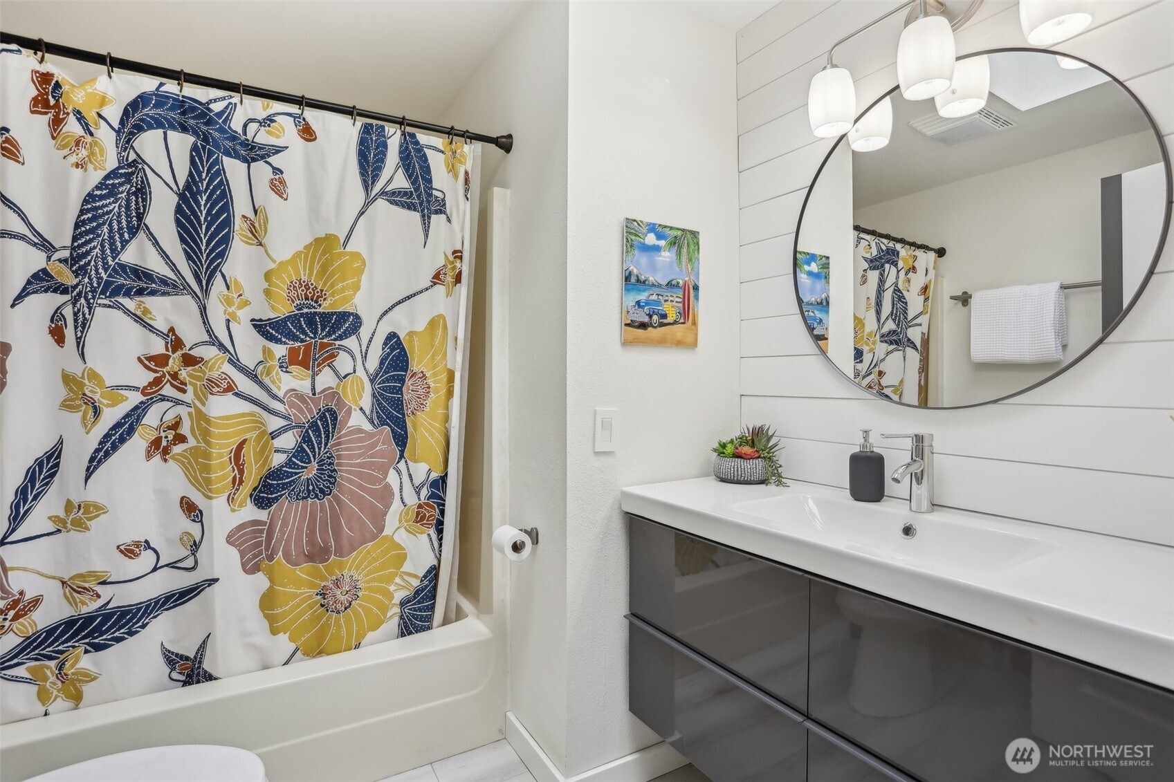 2711 164th Place Southeast Bothell, WA 98012 - Photo 13 of 26 a bathroom with a sink and a mirror