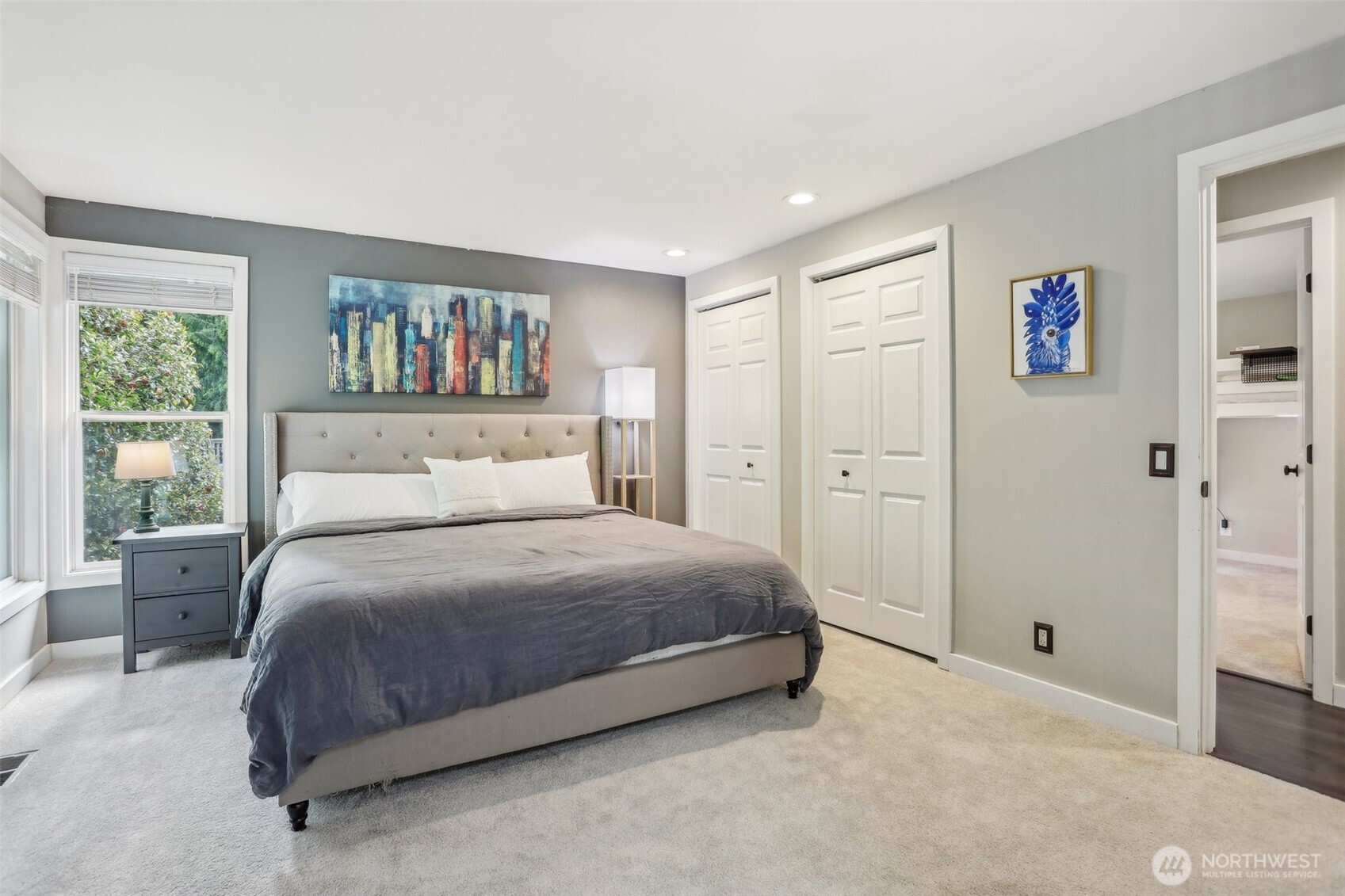 2711 164th Place Southeast Bothell, WA 98012 - Photo 14 of 26 a bedroom with a bed and a large window